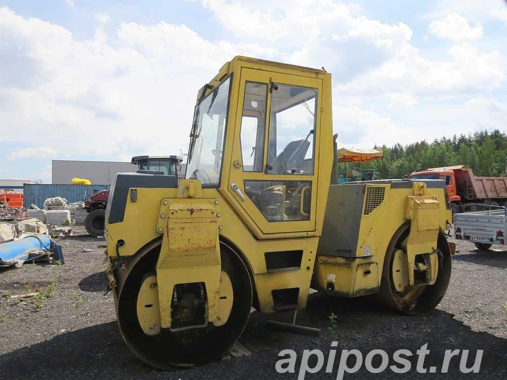 Асфальтовый тандемный каток Bomag 144 8,5 т, разрезные...